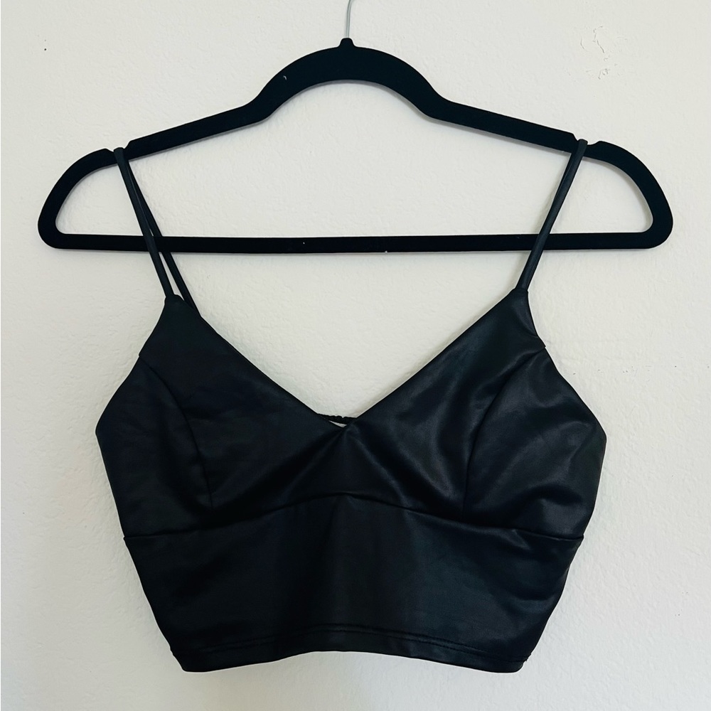 Black leather crop top.